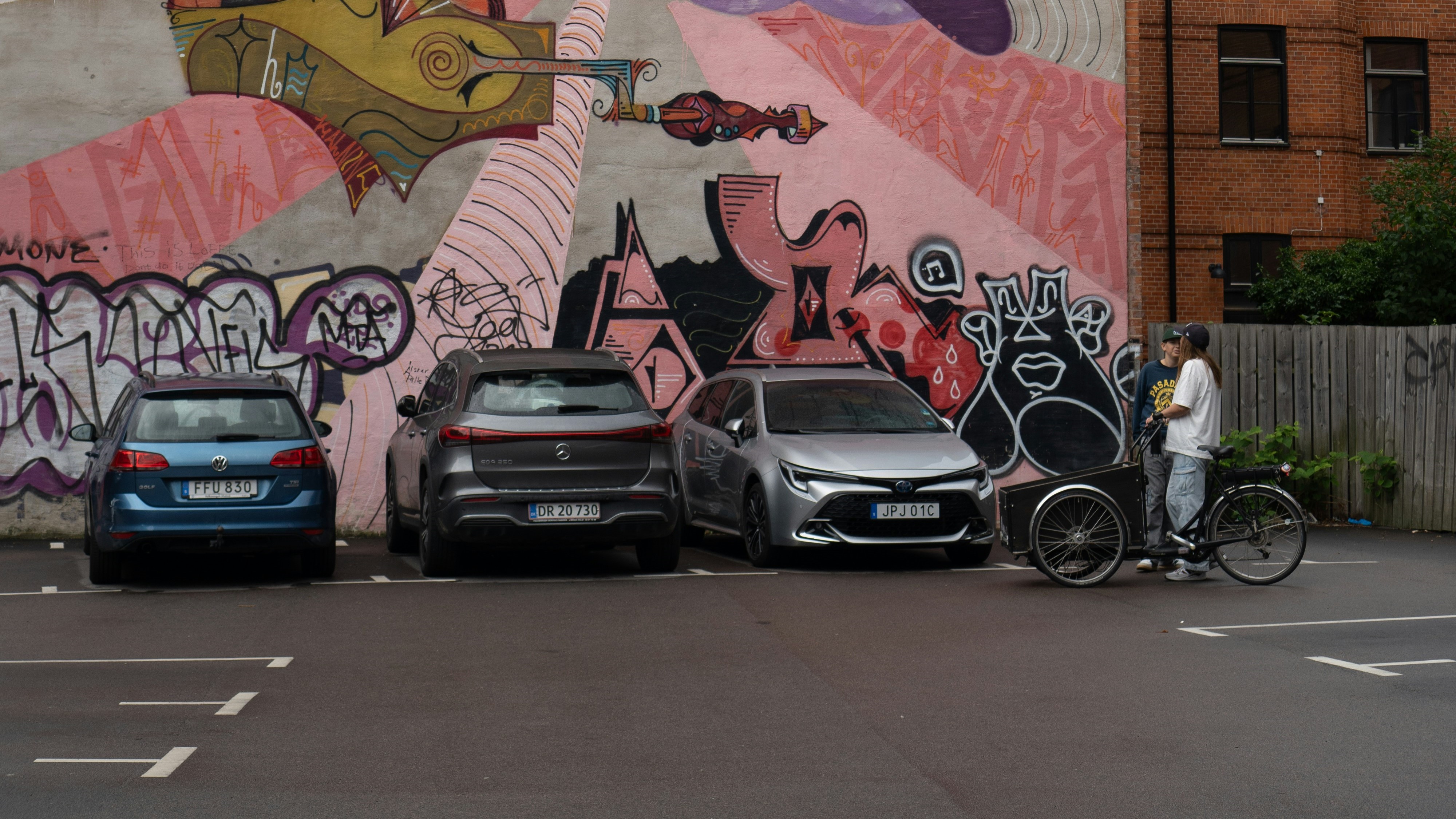 A vibrant street art mural with multiple elements